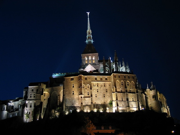 The abbey at night.. The little speck at the top is the statue.